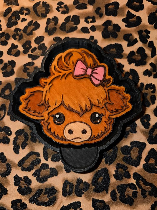 Cow with bow